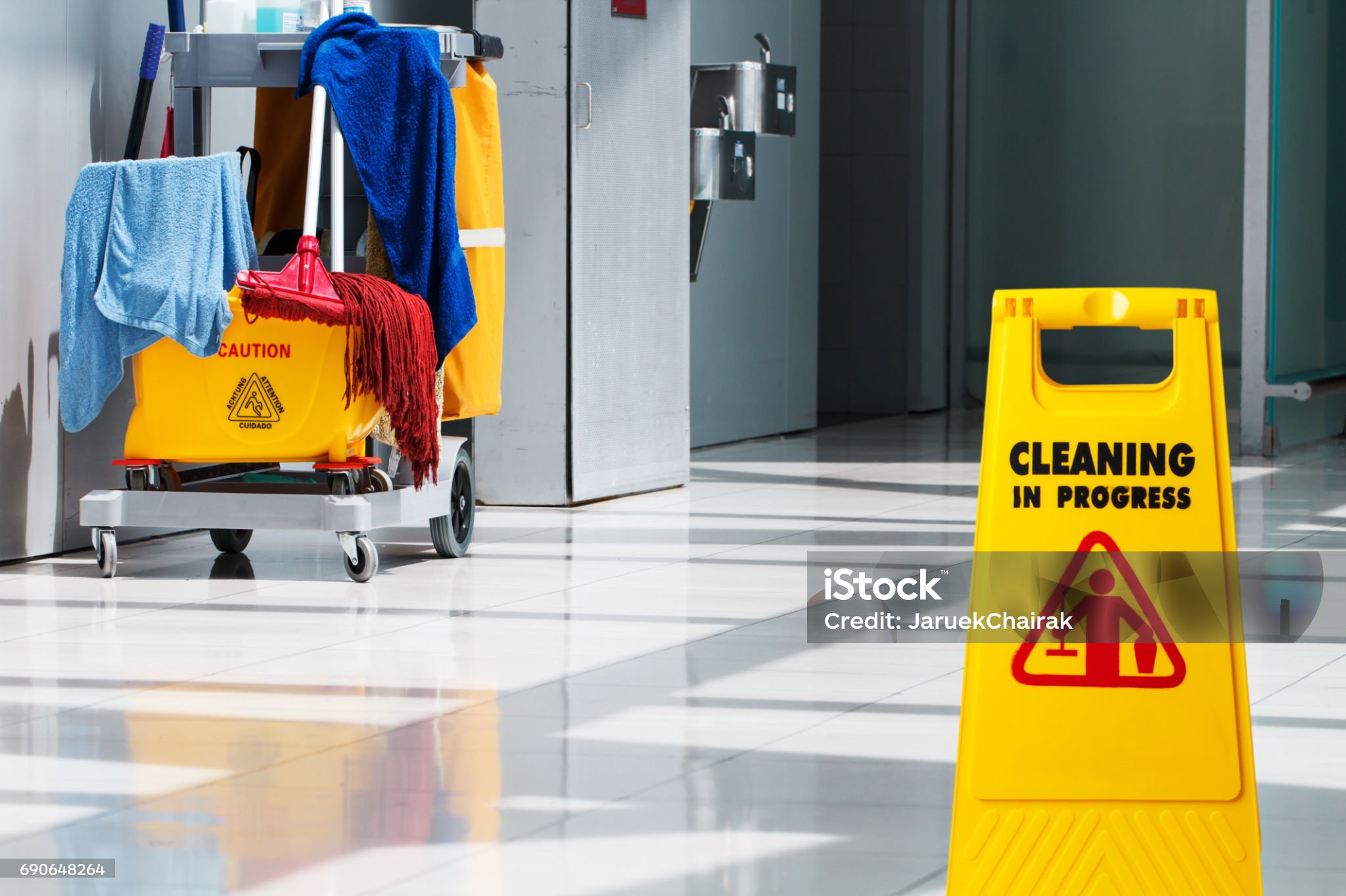 Janitorial and mop bucket on cleaning in process